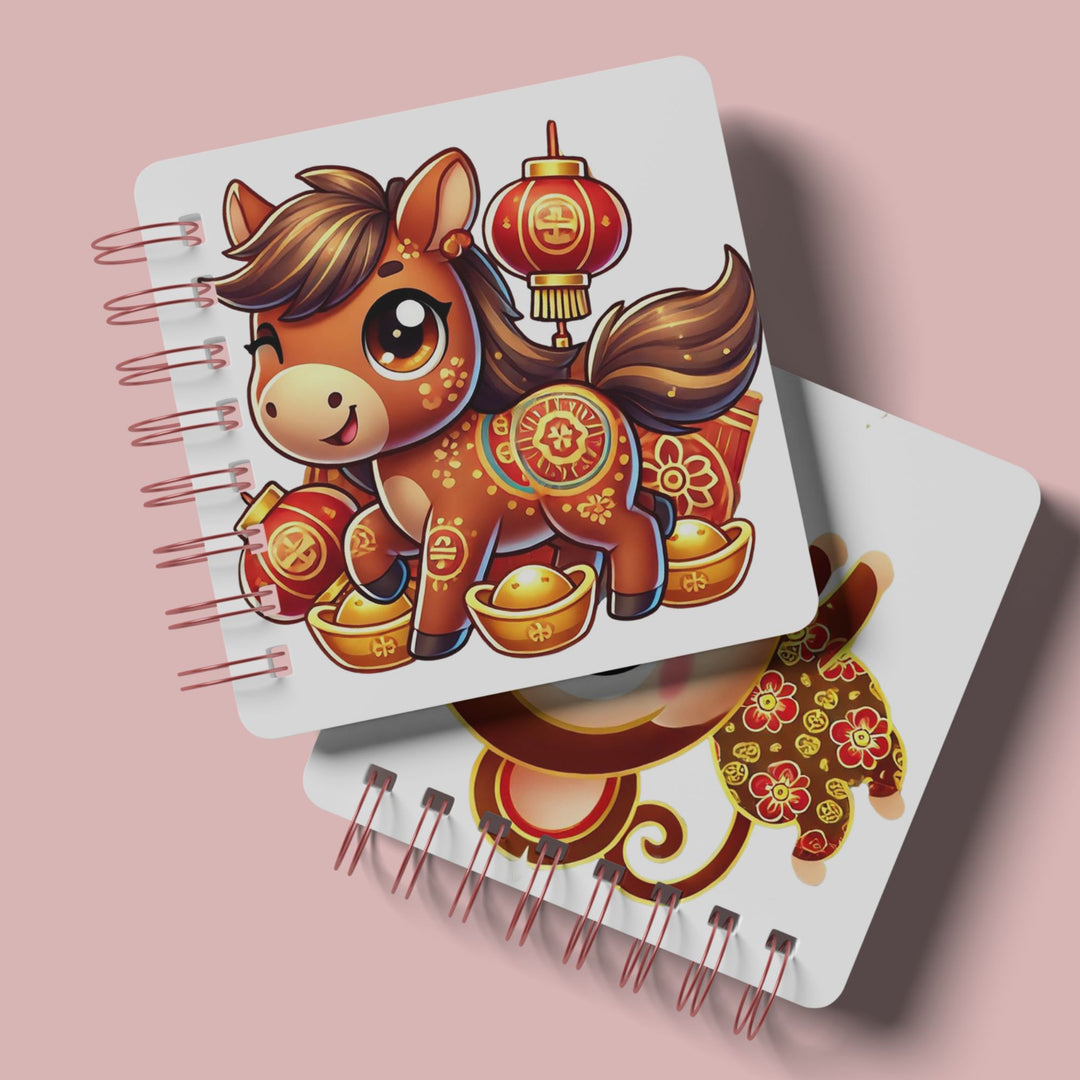 Chinese Zodiac horse and monkey on a small notebook